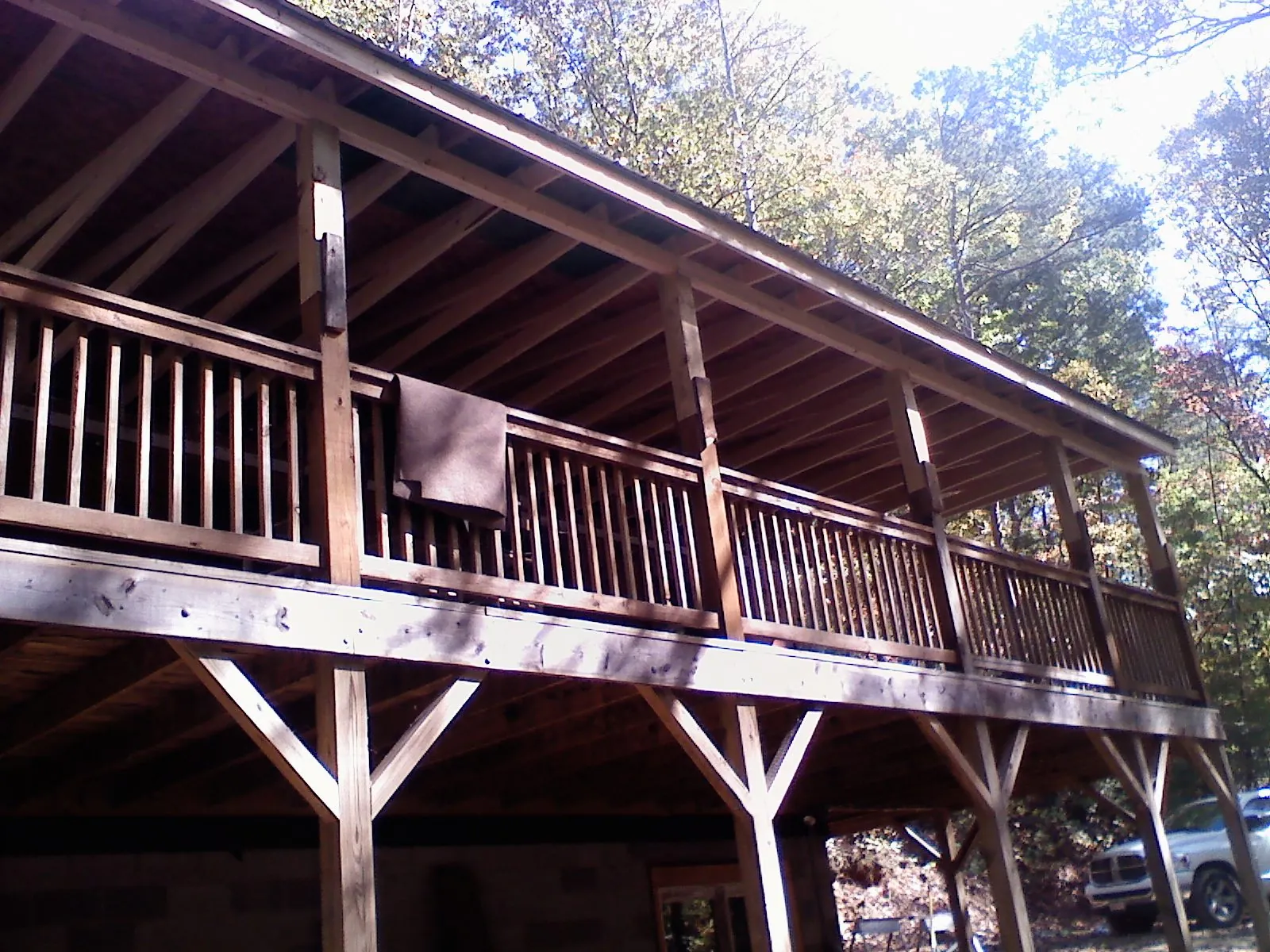 Timber framing under a new elevated porch and deck — Roof Leak Repair in Rushsylvania by Roofing Brothers